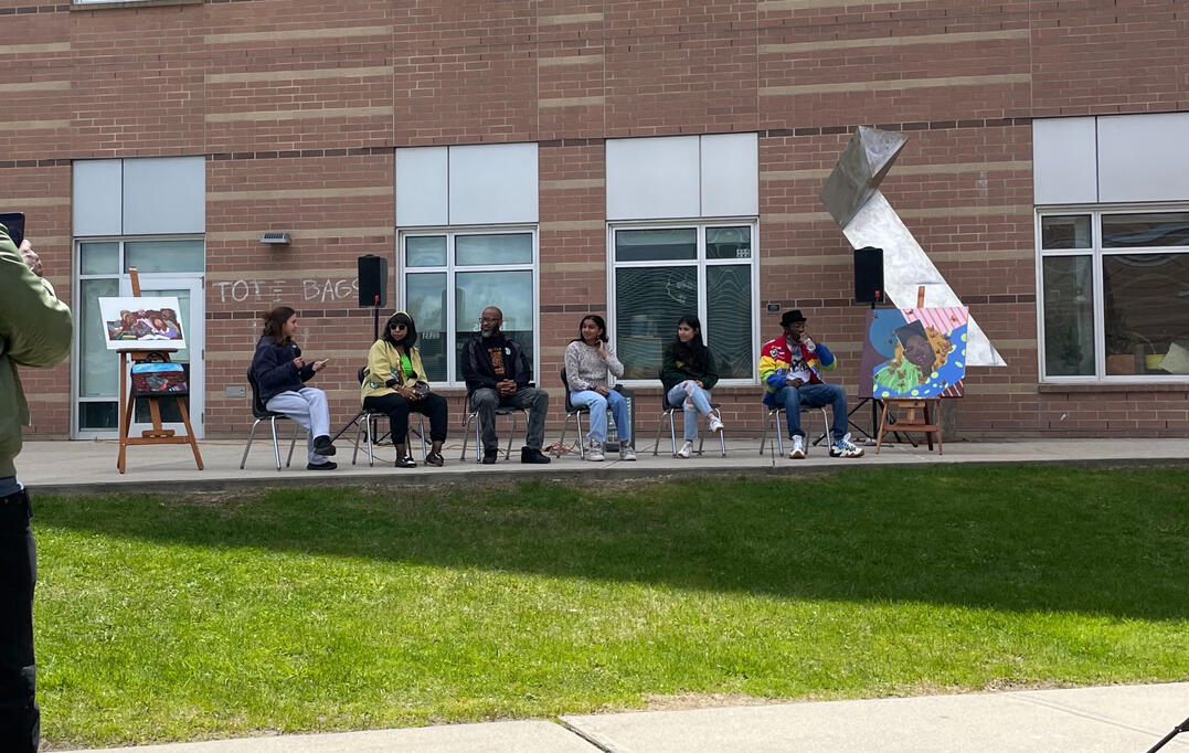 Featured artists Danice D. Marshall, Khari Roulhac, ZZ Sayeed, Olivia Helfrich-Tapia and Jammal Eversley (left to right) answer questions in an artists of color panel.