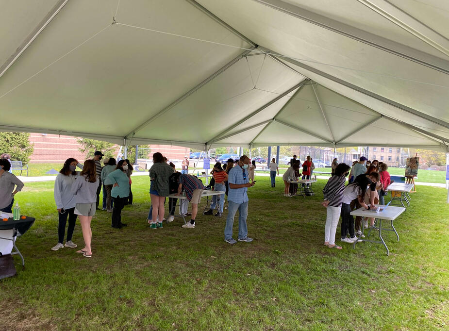 Attendees browse the art displays